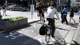 Real-life cyclists using a bike lane.