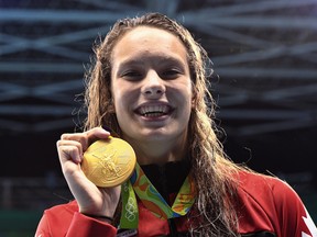 Canada's Penny Oleksiak wins a gold medal in the 100-metre freestyle, one of four medals she collected at Rio 2016.