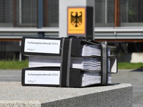 Files with the citizens' lawsuit against the free trade agreement CETA are pictured in front of the Federal Constitutional Court in Karlsruhe, Germany, on August 31, 2016.