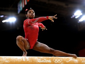 Simone Biles practices on the beam during an artistic gymnastics training session at the Arena Olimpica do Rio on Thursday.