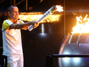 Former marathoner Vanderlei Cordeiro de Lima lights the cauldron during the opening ceremony of the Rio 2016 Olympic Games at Maracana Stadium in Rio de Janeiro on Friday night.
