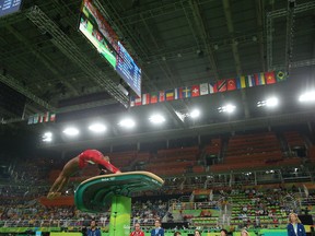 Simone Biles of the United States competes in the Women's Vault Final on Day 9 of the Rio 2016 Olympic Games at the Rio Olympic Arena on August 14, 2016 in Rio de Janeiro, Brazil.