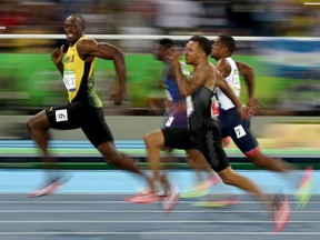 Jamaica's Usain Bolt outruns his opponents in the men's 100-metre semi-final on Sunday.