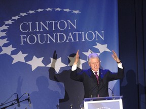 Bill Clinton speaks at an event for his eponymous foundation in 2006. He has said he will leave that post if his wife becomes president.