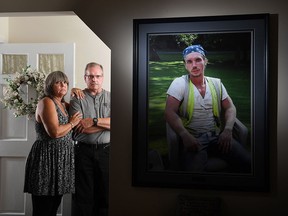 Lorretta and Robert Hawe keep a photo of their late son Ryan at their home in Manassas, Va.