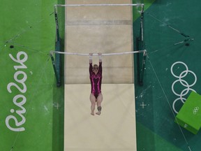 Canada's Isabela Onyshko practices on the uneven bars in Rio on Thursday.