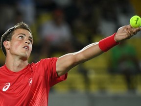 Canada's Vasek Pospisil serves during a first-round singles match at the Rio Olympics on Aug. 6, 2016.