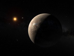 A hand out image made available by the European Southern Observatory on August 24 2016, shows an artist's impression of the planet Proxima b orbiting the red dwarf star Proxima Centauri, the closest star to the Solar System.