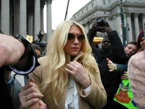 Kesha leaving Supreme Court in New York last February.