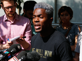 Black Lives Matter Toronto co-founder Rodney Diverlus talks to reporters about the organization’s actions at this year's Pride parade, July 7, 2016.