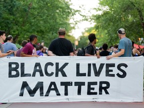 A Black Lives Matter rally is held on July 22, 2016 in Kalamazoo, Michigan. Luz Rentas, whose son recently shot at police officers in Columbia, Pennsylvania, called the group 'irresponsible.'