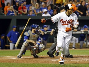 Baltimore Orioles' Manny Machado flips his bat as he rounds the bases after hitting a two-run home run in the fifth inning of  their 5-3 win against the Toronto Blue Jays in Baltimore, Tuesday.