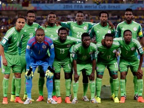Nigeria's men's soccer team poses for a photo before a match at the 2014 World Cup in Brazil. Logistical troubles have so far prevented the team from traveling to Rio 2016.