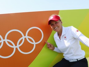 Brooke Henderson poses during a practice round prior to the start of the women's golf tournament  during the 2016 Summer Games at the Olympic Golf Course in Rio de Janeiro, Brazil, on Monday, Aug. 15, 2016.