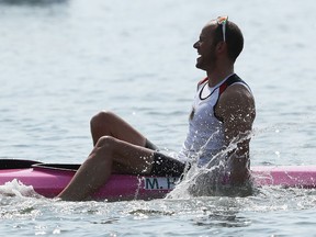 Max Hoff of Germany celebrates winning the gold medal in the men's kayak four 1000m finals