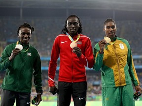 From left to right, Francine Niyonsaba of Burundi, Margaret Nyairera Wambui of Kenya, and Caster Semenya of South Africa stand on the podium during the medal ceremony for the women's 800-metre race at the Summer Olympics in Rio de Janeiro, Brazil, on Aug. 20, 2016.