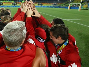 Canada celebrates winning the bronze medal in women's rugby sevens