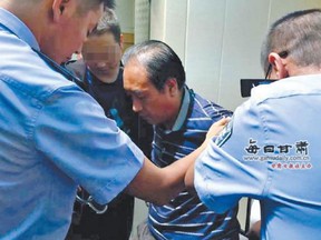 Gao Chengyong is arrested by police in Baiyin City, Gansu province, on August 26, 2016