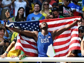 Will Claye of the United States reacts after winning the silver medal in the Men's Triple Jump Final.