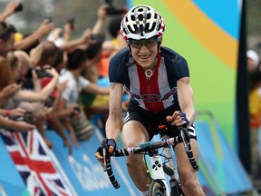 Mara Abbott of the United States crosses the finish line in fourth during the women's road race at Fort Copacabana on August 7, 2016.