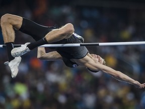 Derek Drouin competes in men's high jump at Rio 2016 on Aug. 16.