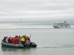 August A launch heading back to the Crystal Serenity docked in Cambridge Bay during its tour of the Northwest Passage.