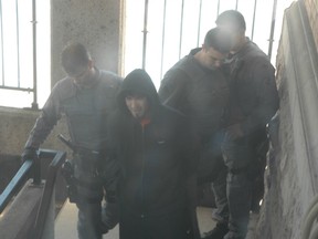 Eric Mearow, 26, is brought into the provincial courthouse on Wednesday, May 4, 2011 in Sault Ste. Marie, Ontario.