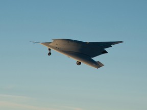 The prototype of a European combat drone, known as Neuron, flies above a military airport in France in 2012.