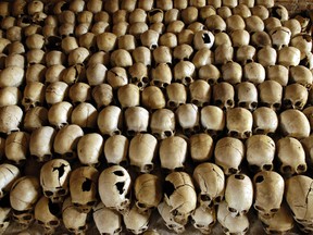 Skulls of the victims of the Ntarama massacre during the 1994 Rwandan genocide are displayed at the Genocide Memorial Site church of Ntarama, in Nyamata, Rwanda, in 2004.