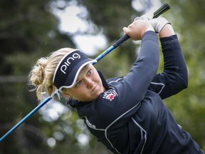 Canada's Brooke Henderson hits a tee shot during the first round of the LPGA Canadian Women's Open tournament in Priddis, Alta., on Thursday.