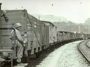 This WWII photo, released by US lawyers Hagen Berman as part of a lawsuit against the US government, purports to show a German Nazi train with the spoils of war: crystal, artwork and gold that had been seized from Hungarian Jews during the Holocaust. The suit claims that US troops seized the train, American officers plundered its contents and other pieces were auctioned off to raise money for relief agencies.