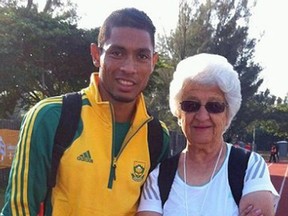 South Africa’s Wayde van Niekerk and coach Ans Botha — her pupils call her “Tannie Ans.”