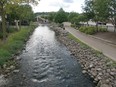 A file photo of the Fox River flowing through downtown Waukesha, Wis.