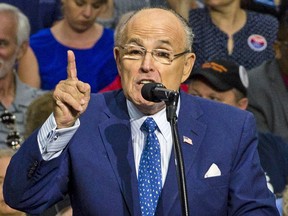 Former New York mayor Rudy Giuliani addresses supporters at a rally for Republican presidential candidate Donald Trump on August 22, 2016 in Akron, Ohio.