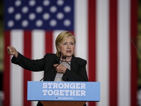 Hillary Clinton, 2016 Democratic presidential nominee, speaks during a campaign event in Warren, Michigan, U.S., on Thursday, Aug. 11, 2016. On Wednesday, the Clinton campaign launched "Together for America," an initiative to recruit GOP endorsements, and announced support from nearly 50 Republicans, including George W. Bush's former Director of National Intelligence.