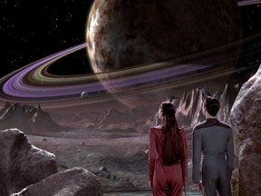 Local Input~ Salia and Wesley Crusher view a holographic reproduction of an unnamed planetoid on the holodeck in 2365. From Star Wars: The Next Generation.(TNG: "The Dauphin") Courtesy of Paramount Pictures.