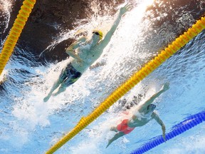 Australia's Mack Horton (left) and China's Sun Yang (right) compete in the final of the men's 400-metre freestyle at the Summer Olympics in Rio de Janeiro, Brazil, on Saturday, Aug. 6, 2016.