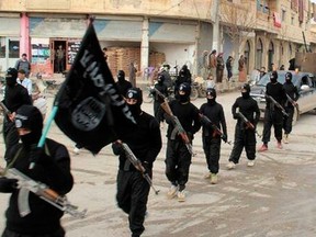 Fighters from the Islamic State group marching in Raqqa, Syria, in a photo released in 2014.