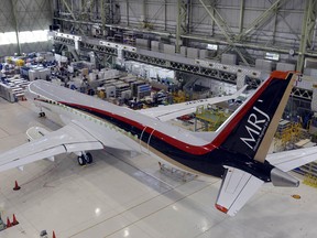 In this June 26, 2014 photo, Mitsubishi's new regional jet MRJ is at the company's Komaki south plant in Komak