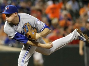 Righthander Aaron Sanchez of the Toronto Blue Jays throws a pitch against the Baltimore Orioles in AL East Division action Wednesday in Baltimore. Sanchez pitched six innings to pick up the victory in a 5-3 decision over the Orioles.