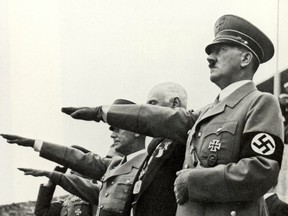 Adolf Hitler and his staff salute the teams during the opening ceremonies of the XI Olympic Games on August 1, 936 in Berlin, Germany.