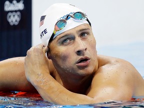 In this Tuesday, Aug. 9, 2016, file photo, United States’ Ryan Lochte checks his time in a men’s 4x200-metre freestyle heat during the 2016 Summer Olympics, in Rio de Janeiro, Brazil.