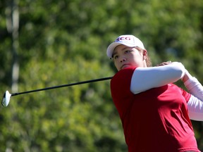 Ariya Jutanugarn of Thailand follows through on a shot during the second round of the Canadian Pacific Women's Open at Priddis Greens Golf and Country Club west of Calgary on Friday.