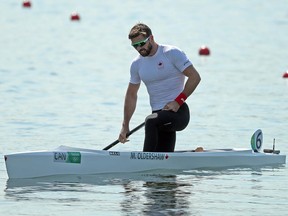 Canada's Mark Oldershaw catches his breath after finishing the Canoe Single 1000m during the 2016 Summer Olympics in Rio de Janeiro, Brazil, on Monday Aug. 15, 2016.