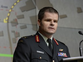 Mike Rouleau addresses a news conference in Ottawa, Tuesday, May 12, 2015.