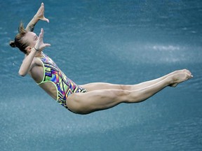 Russia's Nadezhda Bazhina competes during the women's 3-metre springboard diving preliminary round in the Maria Lenk Aquatic Centre at the 2016 Summer Olympics in Rio de Janeiro, Brazil, on Friday, Aug. 12, 2016.