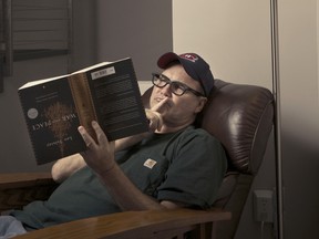 Stand-up comedian, writer and producer Norm Macdonald, shown in Los Angeles, could very well prefer reading War and Peace upside down.