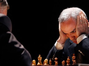 Garry Kasparov, right, and Anatoly Karpov, left, play an exhibition rematch in Valencia, Spain, in 2009.