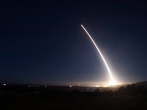 In this Saturday, Feb. 20, 2016 file photo provided by U.S. Air Force, an unarmed Minuteman III intercontinental ballistic missile launches during an operational test at Vandenberg Air Force Base, Calif.