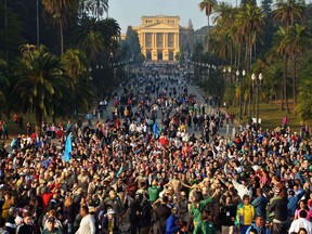 People gather at Independence Park to celebrate the arrival of the Olympic torch in Sao Paulo, Brazil, on July 24, 2016.